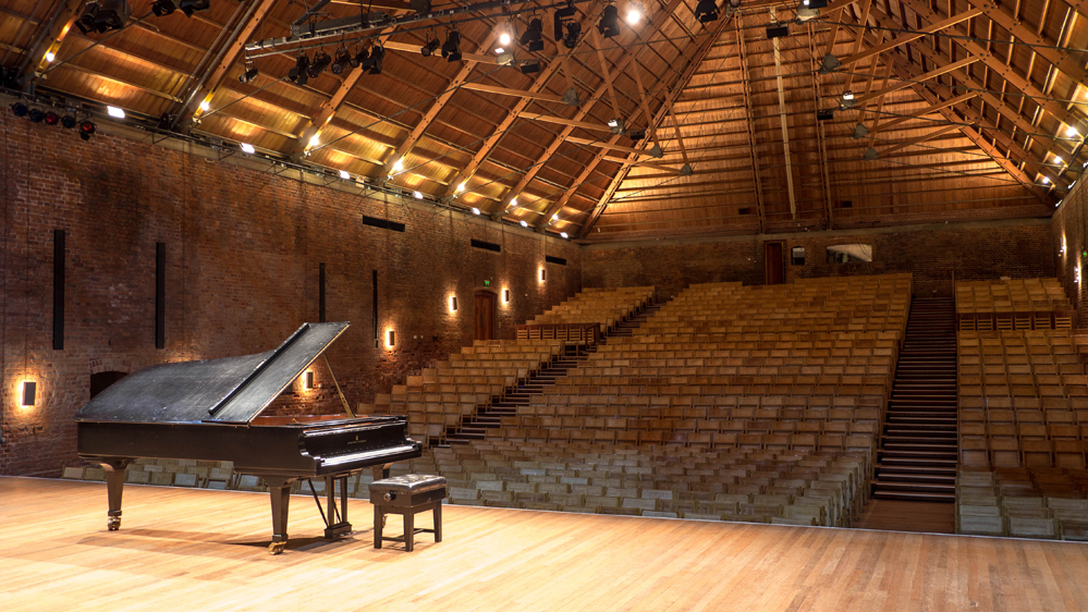 Empty Snape Maltings Concert Hall with grand piano