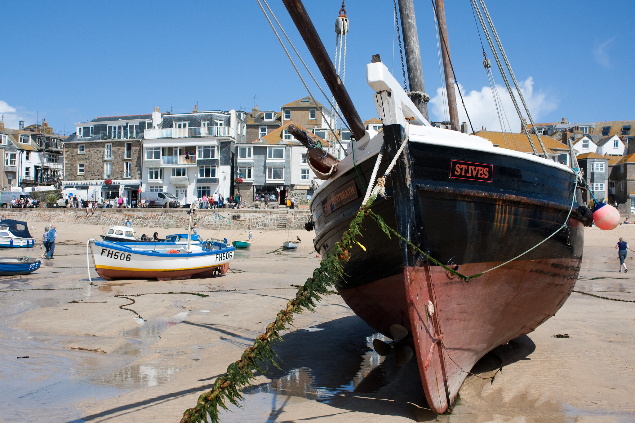 Fishing boat on the sand in St. Ives Harbour