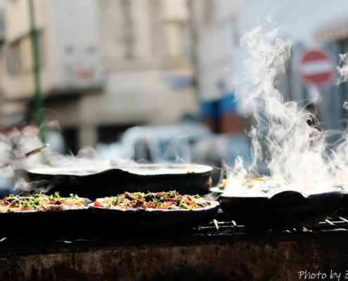cooking in Morocco, tagines at a street market