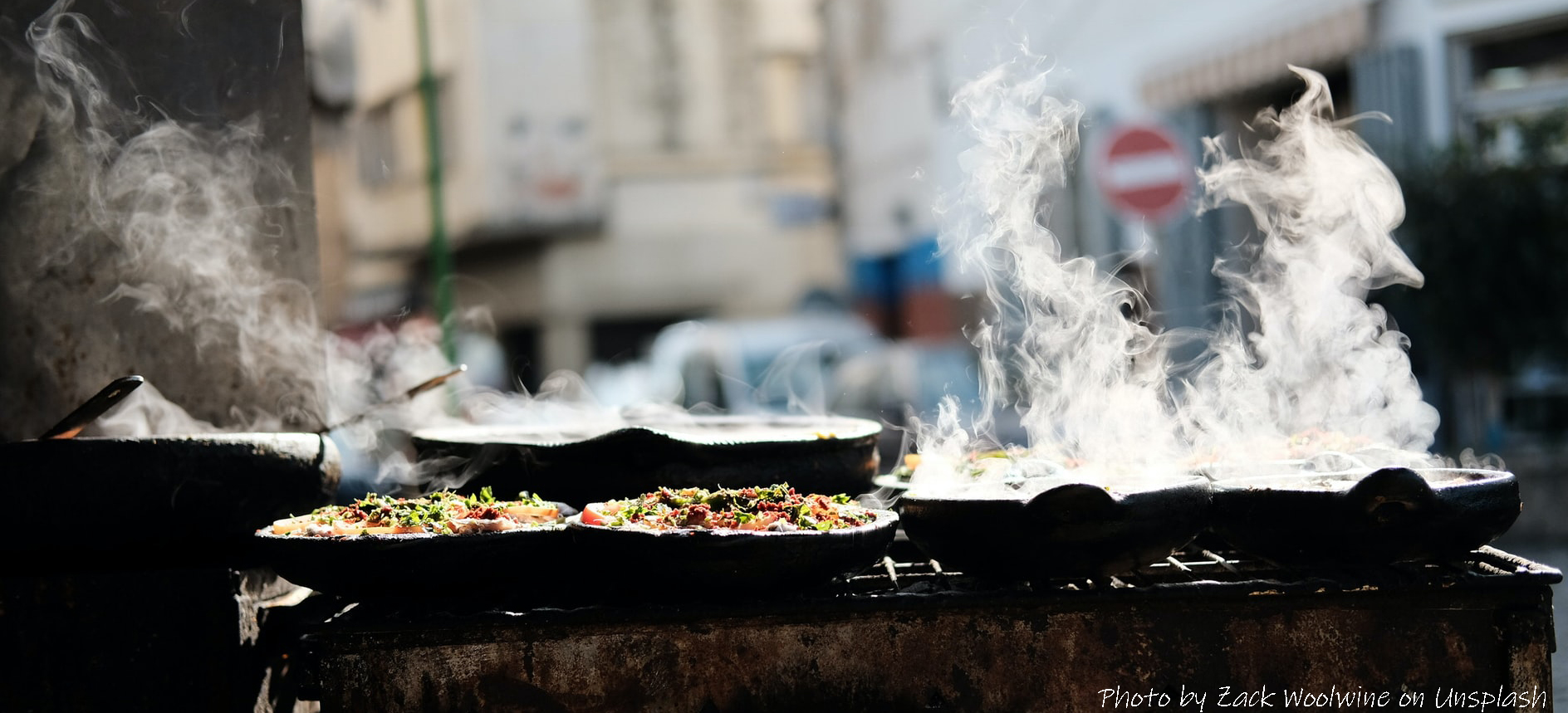 cooking in Morocco, tagines at a street market