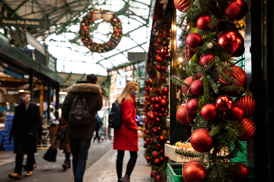 London, England, Borough Market, red. Christmas shopping, masks