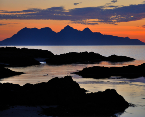 Isle of Rum at Sunset. The sustainability of this small island community is at the heart of a project.