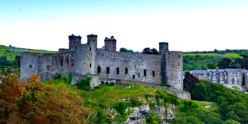 Medieval Castle ruin with corner bastions and crenelated towers.